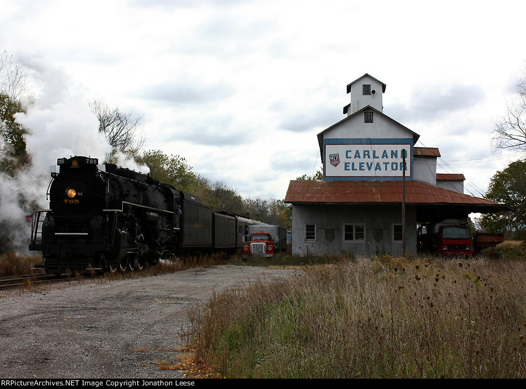NKP 765 rolls north past the Carland elevator